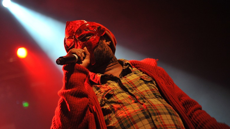 MF DOOM wearing a red mask