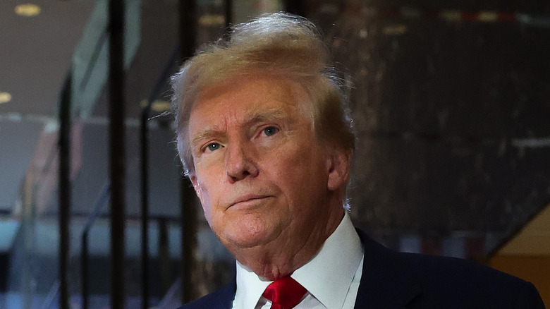 Donald Trump walking with messy hair