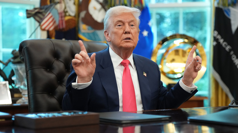 Donald Trump speaking to reporters at the Oval Office.
