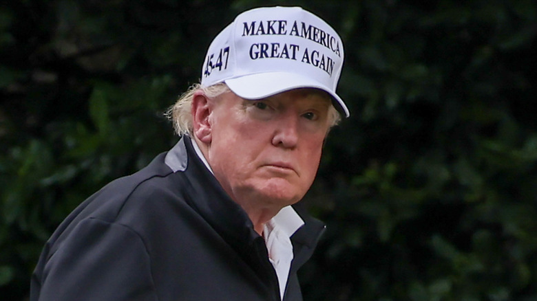 Donald Trump walking at the White House