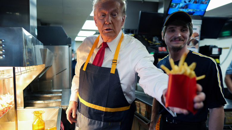 Donald Trump holding McDonald's french fries