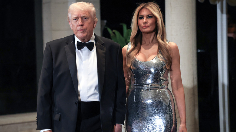 Donald and Melania Trump arrive to the 2025 New Year's Eve party at Mar-a-Lago.