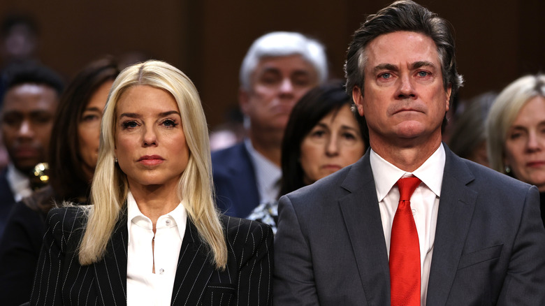 Pam Bondi sitting with John Wakefield