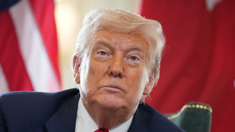 Donald Trump with a tired expression on his face in 2025