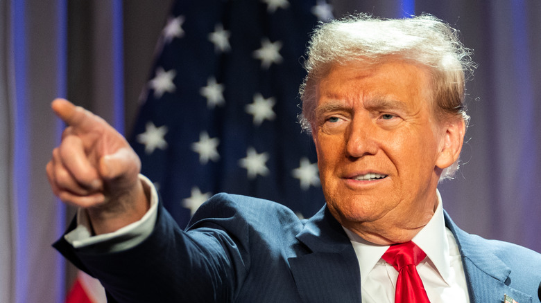 Donald Trump points at crowd during House Republicans Conference meeting