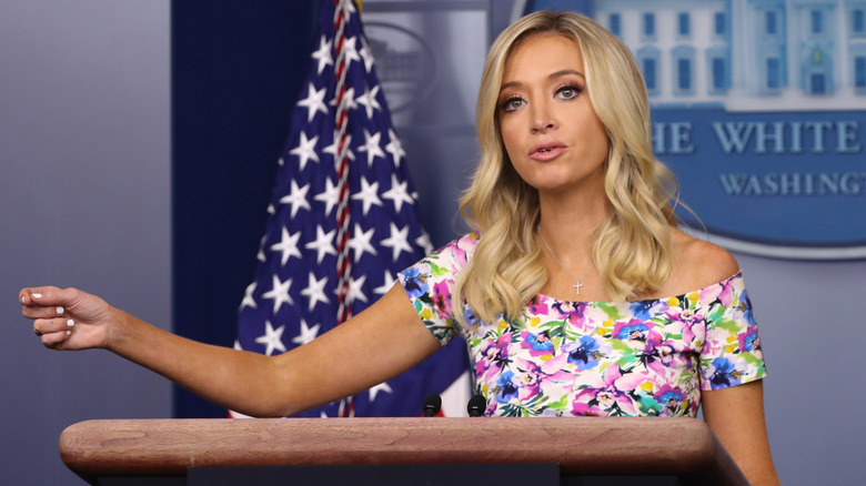 Kayleigh McEnany addressing crowd in floral dress