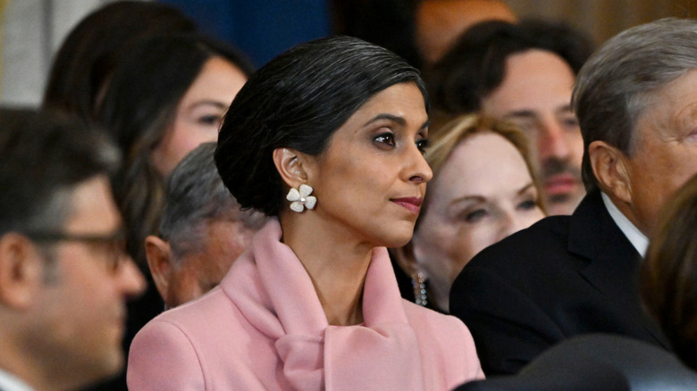 Usha Vance in a pink coat