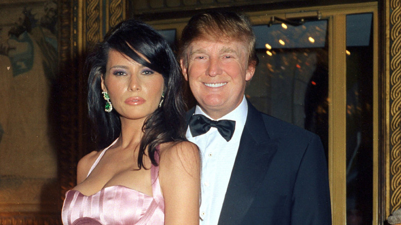 Melania Trump with black hair and Donald Trump wearing a bowtie