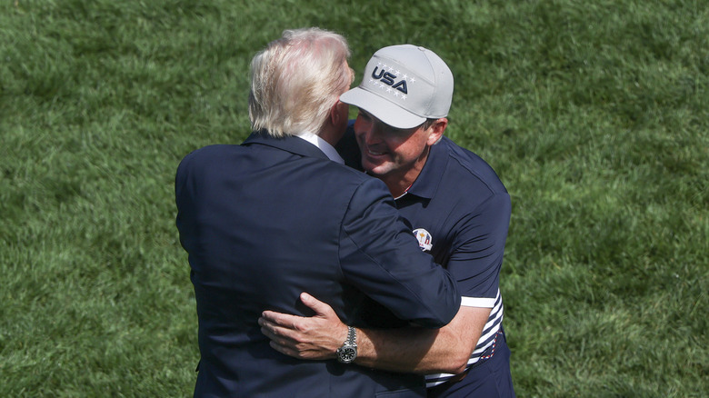 Donald Trump hugging Keegan Bradley