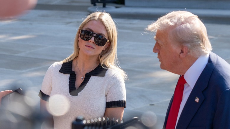 Karoline Leavitt and Donald Trump taking questions