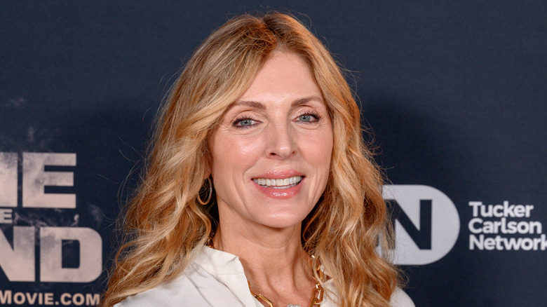 Marla Maples poses in white outfit in 2024
