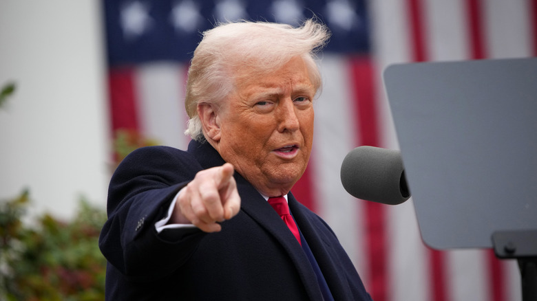 President Donald Trump gesturing while speaking during a 