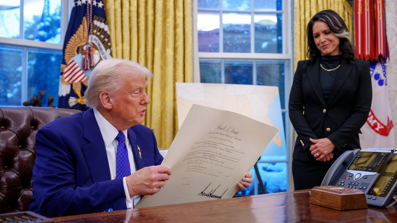 Donald Trump signing in Tulsi Gabbard