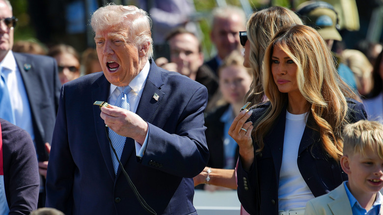 Donald Trump signaling the start of the 2026 Easter Egg Roll