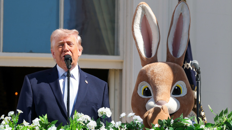 Donald Trump making a speech alongside the Easter Bunny.