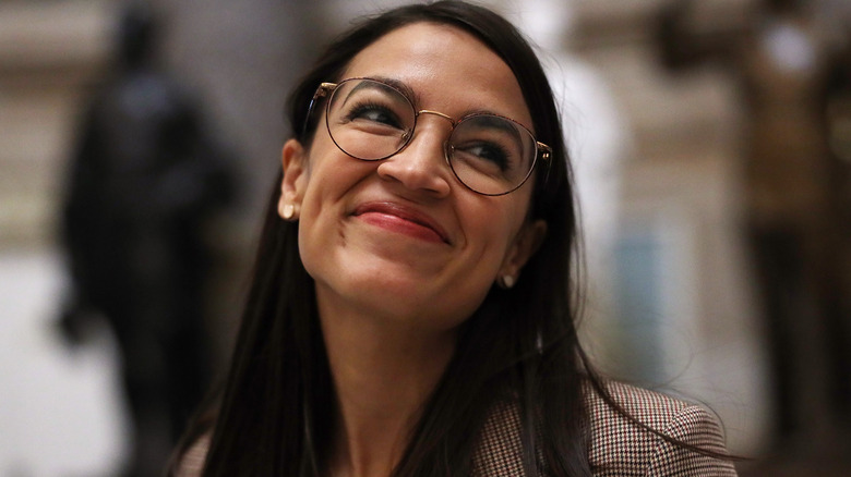 Alexandria Ocasio-Cortez, smiling