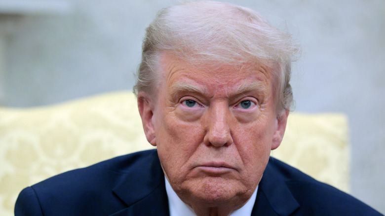 Donald Trump solemn white hair