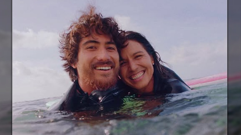 Tulsi Gabbard and her husband, Abraham Williams in the water