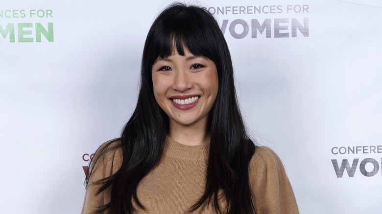 Constance Wu posing at an event
