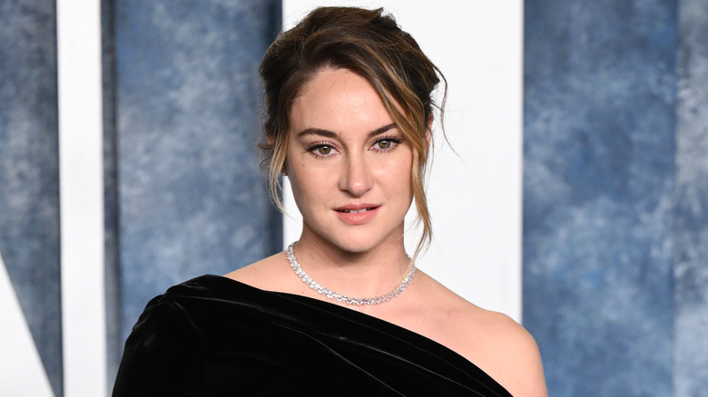 Shailene Woodley posing at an event