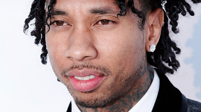 Tyga clean cut with diamond earring