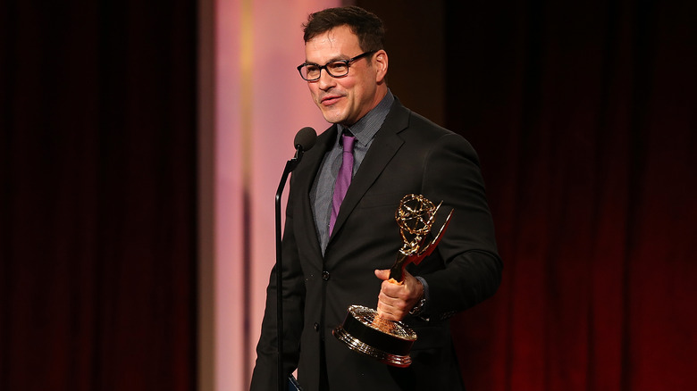 Tyler Christopher holding Emmy