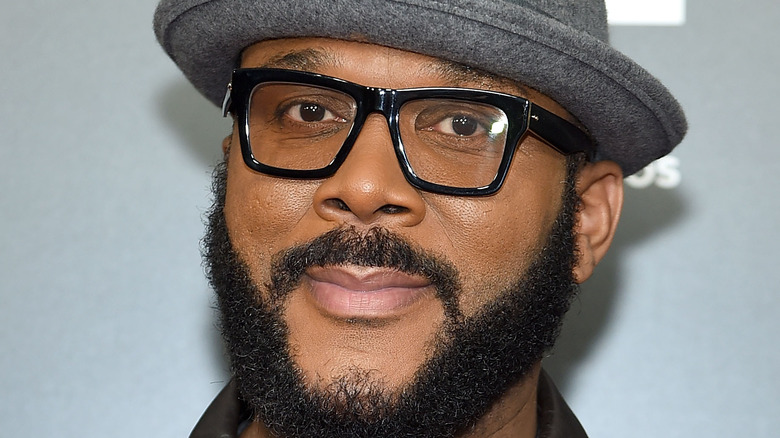 Tyler Perry wearing a fedora hat