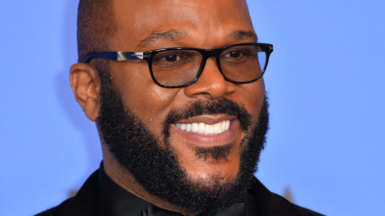 Tyler Perry smiling with beard