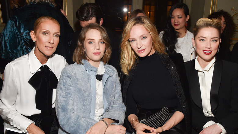 Maya Hawke poses for a photo with Celine Dion, Uma Thurman and Amber Heard