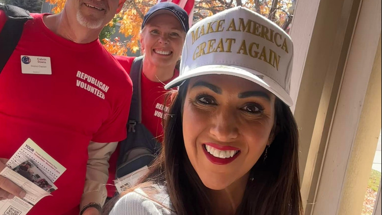 Lauren Boebert wearing a white MAGA hat