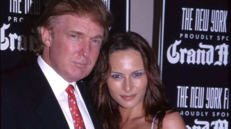 Donald Trump posing with Melania Trump
