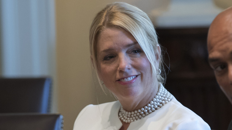 Pam Bondi listening at the White House