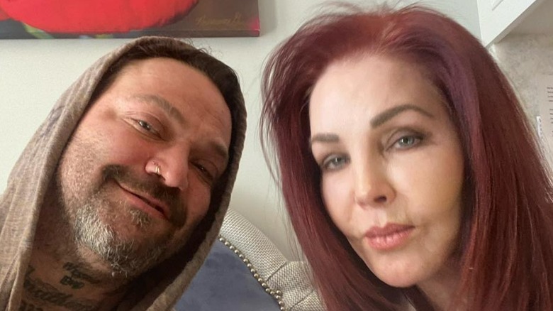 Bam Margera and Priscilla Presley posing