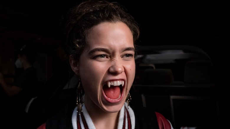 Sarah Catherine Hook baring her fangs in a scene from First Kill