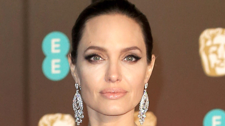 Angelina Jolie wearing chandelier earrings