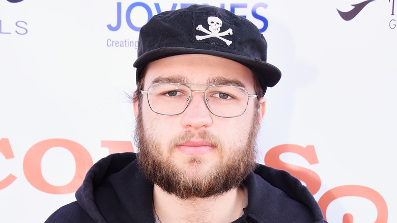 Angus T. Jones posing