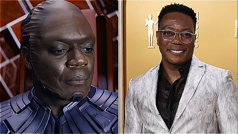 Chukwudi Iwuji as the High Evolutionary in "Guardians of the Galaxy Vol. 3" / Chukwudi Iwuji wearing glasses, a silver patterned blazer, a black shirt, and a black neck tie