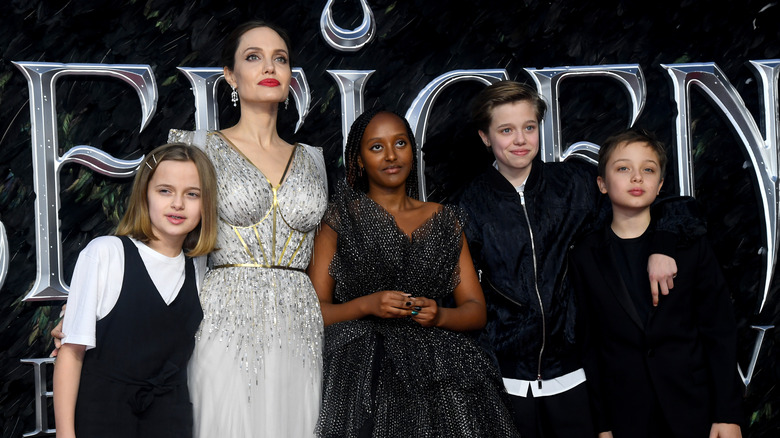 Angelina Jolie and her children posing at premier
