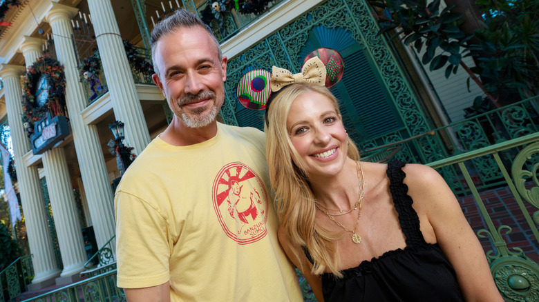 Freddie Prinze Jr. and Sarah Michelle Gellar at Haunted Mansion Holiday at Disneyland Park