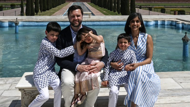Usha Vance and JD Vance posing with their kids during Taj Mahal visit