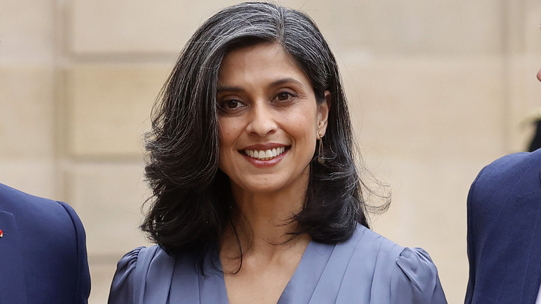 Usha Vance wearing a lilac suit while smiling for the camera