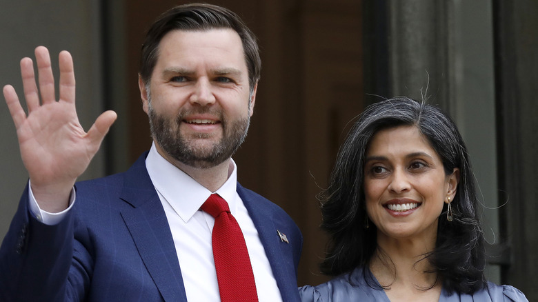 JD Vance waving next to Usha Vance
