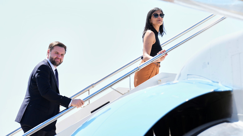 JD and Usha Vance boarding airplane