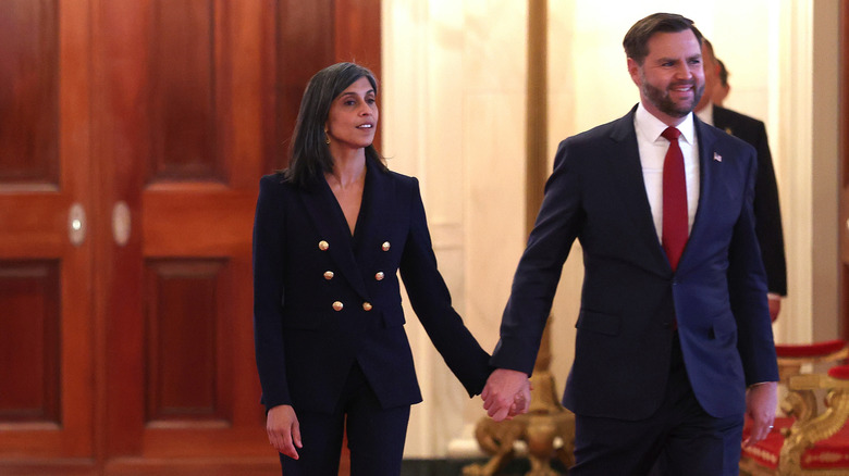 JD and Usha Vance walking together