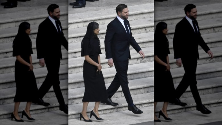 Usha Vance and JD Vance walking down stairs in St. Peter's Square ahead of Pope Leo XIV's inauguration mass
