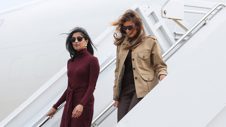 Usha Vance and Melania Trump stepping off a plane