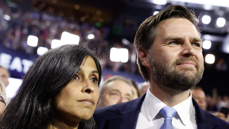 Usha and JD Vance looking somber at an event