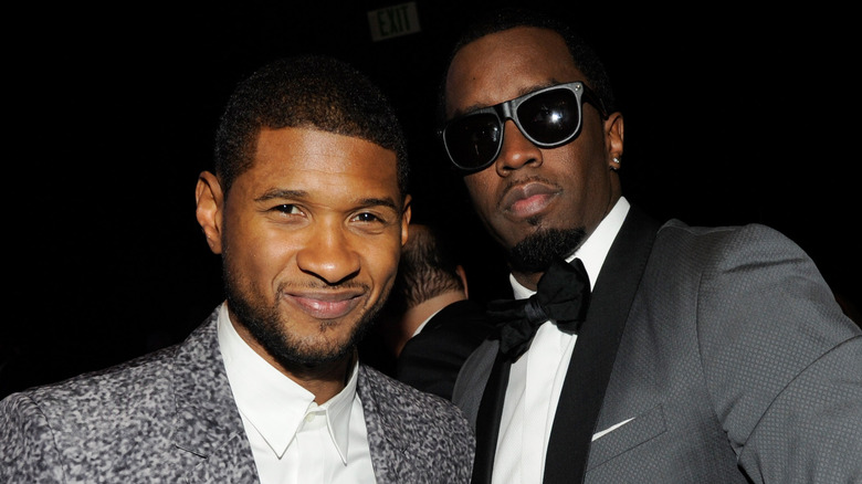 Usher smiling with Diddy 