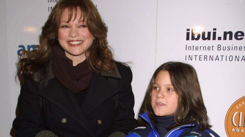 A young Wolfgang Van Halen standing with Valerie Bertinelli