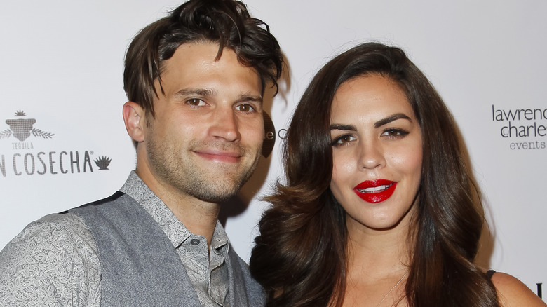 Katie Maloney smiling with Tom Schwartz
